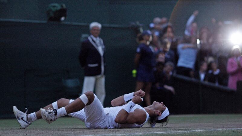 Rafael Nadal celebrates his epic 2008 Wimbledon victory over Roger Federer. The Spaniard won  6-4 6-4 6-7 6-7 9-7 in a match considered the greatest of all time. Photograph:   Adrian Dennis/AFP/Getty Images
