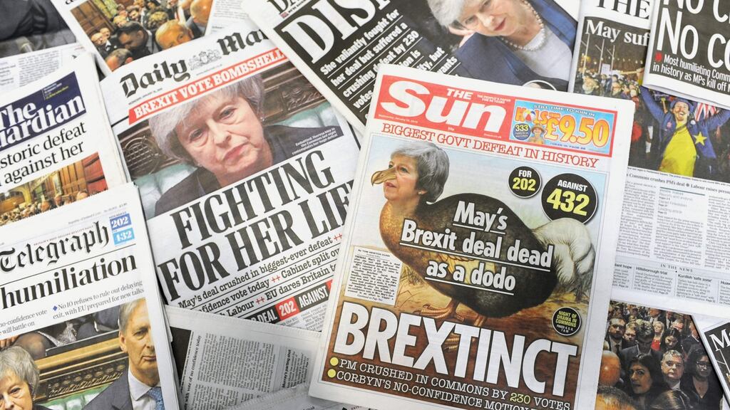 An arrangement of daily newspapers photographed in London on January 16, 2019 shows front pages reporting on the UK parliament's rejection of the government's Brexit deal. - Prime Minister Theresa May was left "crushed" and "humiliated", Britain's newspapers said on January 16 as they raked over the fallout from parliament's huge rejection of her EU divorce deal. (Photo by DANIEL SORABJI / AFP)DANIEL SORABJI/AFP/Getty Images