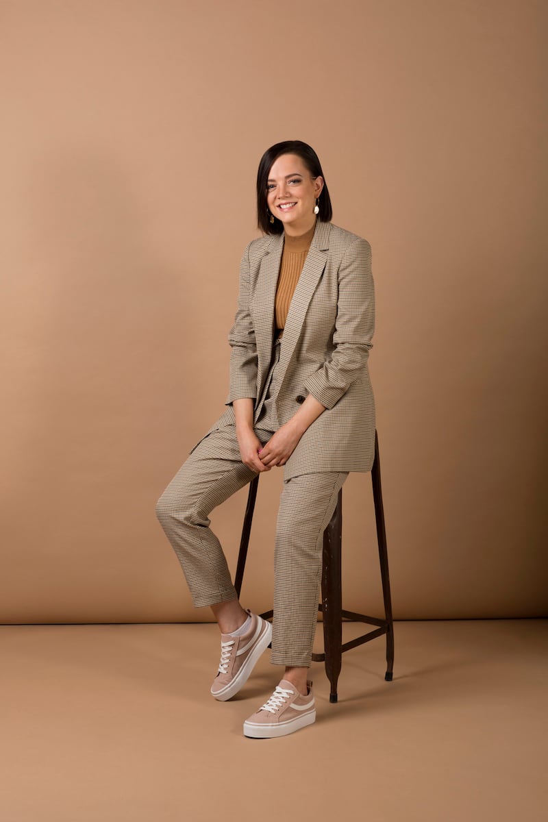 Marcella Peate Sorensen: check suit jacket €25, polo neck €8, trousers €15, trainers €10, ear-rings €2