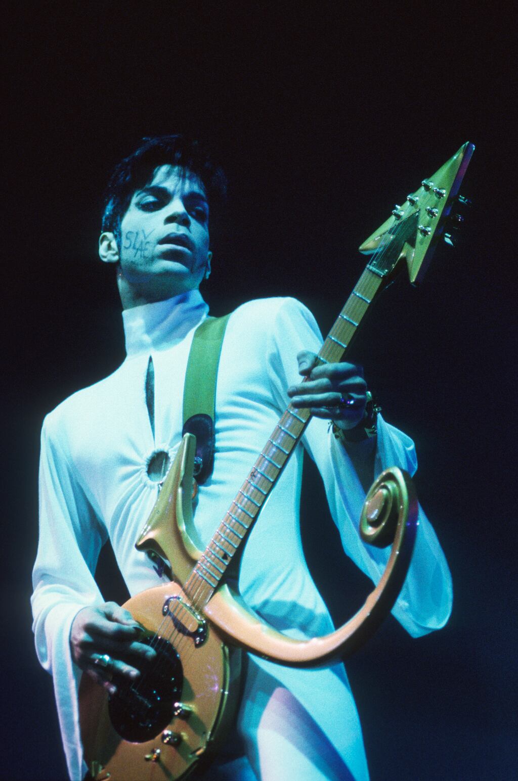 At war: Prince with Slave written on his cheek during his fight with Warner Bros, his record company, in 1995. Photograph: Gie Knaeps/Getty