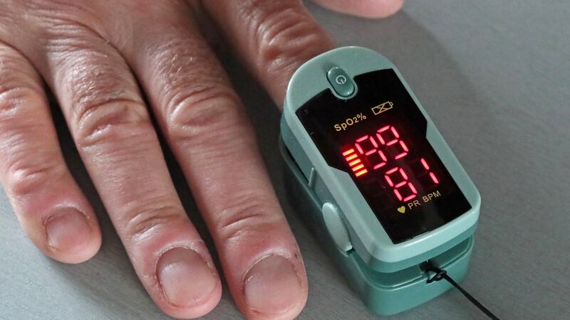 A pulse oximeter is an easy-to-use and relatively cheap device that measures oxygen levels in the blood. Photograph: Vladimir Gerdo\TASS via Getty