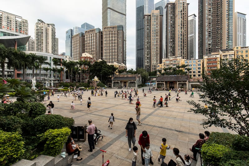 Children playing Xiasha Village: Raising a child to the age of 18 is more expensive in China than almost anywhere in the world. Photograph: Qilai Shen/New York Times