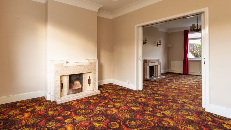 Interconnecting reception rooms  with 1930s Art Deco-ish fireplaces