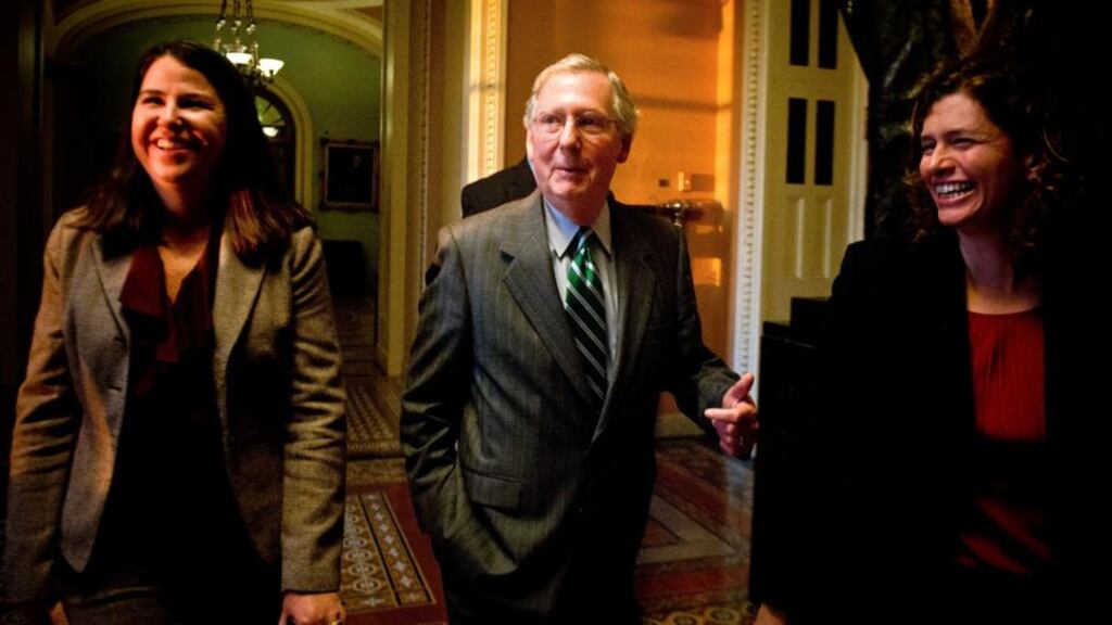 Senate minority Leader Mitch McConnell leaves the Senate floor in Washington. Democratic and Republican leaders in the Senate were close late last night to an agreement that would increase the nation’s borrowing authority and provide enough money to operate the government until the end of the year. Photograph: Gabriella Demczuk/The New York Times