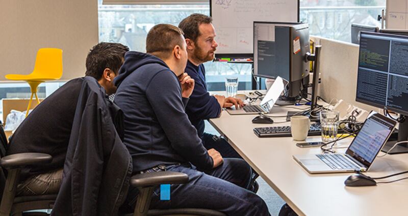 Software engineers at work. We start with the customer and work backwards.