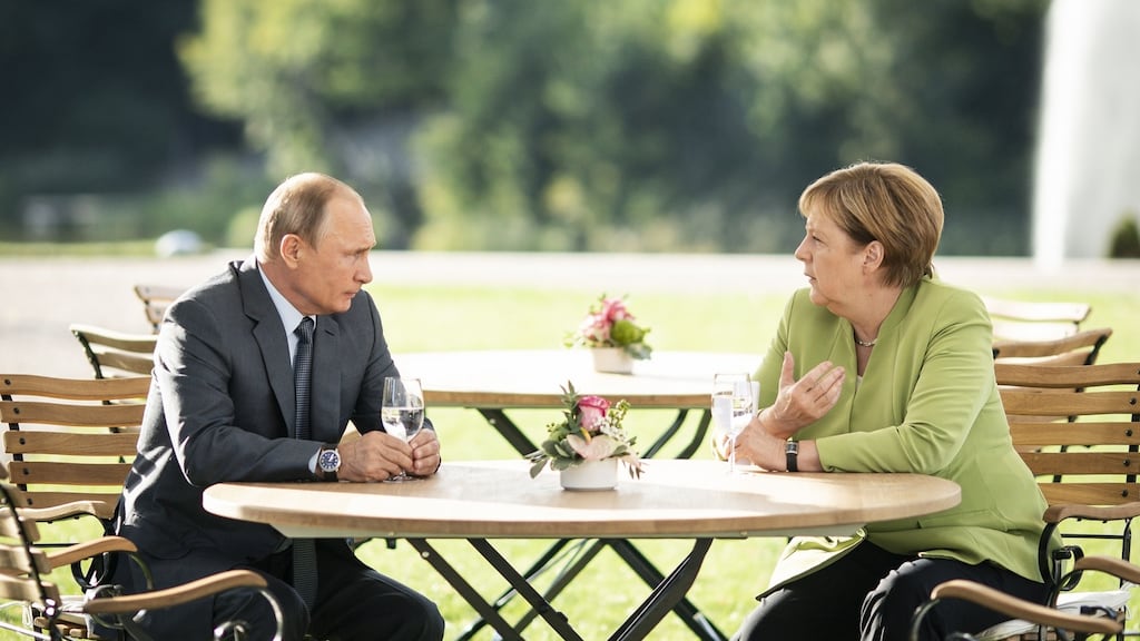 German chancellor Angela Merkel and Russian president Vladimir Putin at Schloss Meseberg palace. Photograph: Steffen Kugler/Bundesregierung via Getty Images