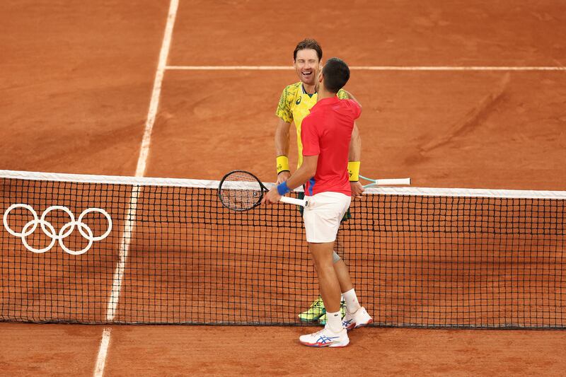 Matthew Ebden of Team Australia congratulates Novak Djokovic of after his defeat to the Serbian in the Olympic Men's Singles at Roland Garros. Photograph: Matthew Stockman/Getty Images
