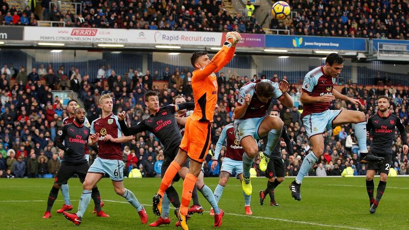Burnley goalkeeper Nick Pope punches during his side’s narrow defeat to Arsenal. Photograph: Andrew Yates/Reuters