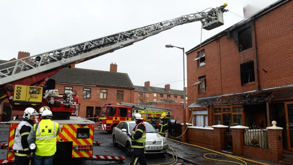 Dublin Fire Brigade members at the scene of a house fire on Gloucester Place off Seán McDermott Street. Photograph: Dara Mac Dónaill / The Irish TimesPhotograph