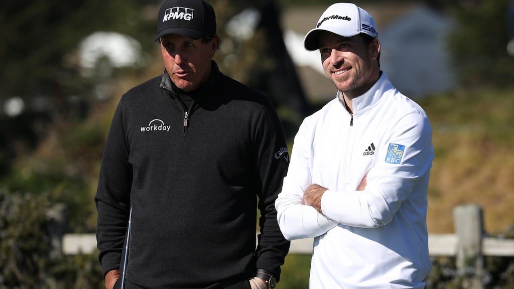 Phil Mickelson and Nick Taylor during the final round of the 2020 Pebble Beach Pro-Am in California. Photograph: EPA