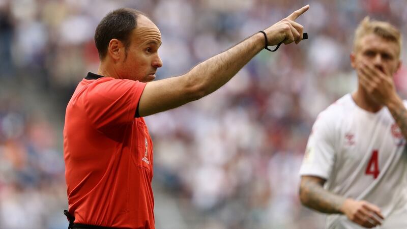 Antonio Mateu awards Australia a penalty after consulting VAR. Photogrpah: Robert Cianflone/Getty