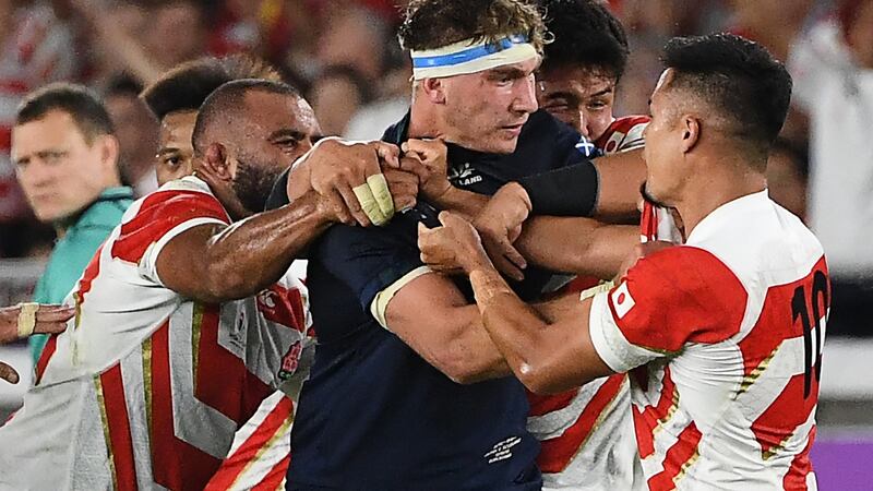 Scotland flanker Jamie Ritchie confronts Japan outhalf Yu Tamura during the side’s Rugby World Cup game in Yokohama. Photograph: William West/AFP via Getty Images