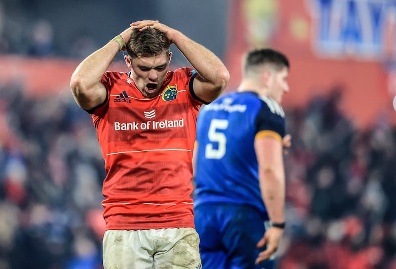 Munster’s Jack Crowley is dejected at the full-time whistle after losing to Leinster by a point. Photograph: Dan Sheridan/Inpho