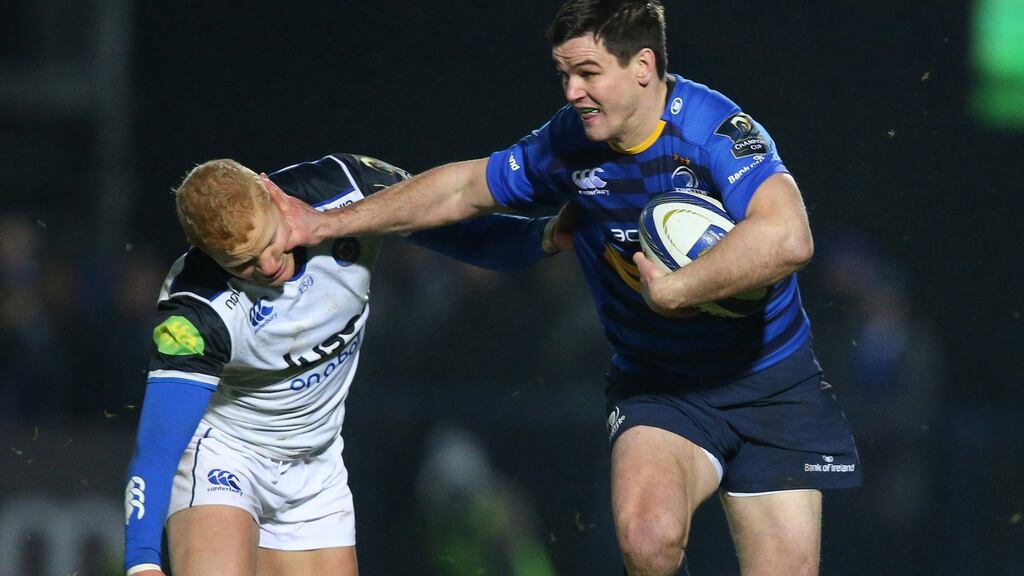 Jonathan Secton hands off Bath’s Tom Homer at the RDS. “I’ve said it all along, from day one, I rely on everyone around me.” Photograph: Billy Stickland/Inpho