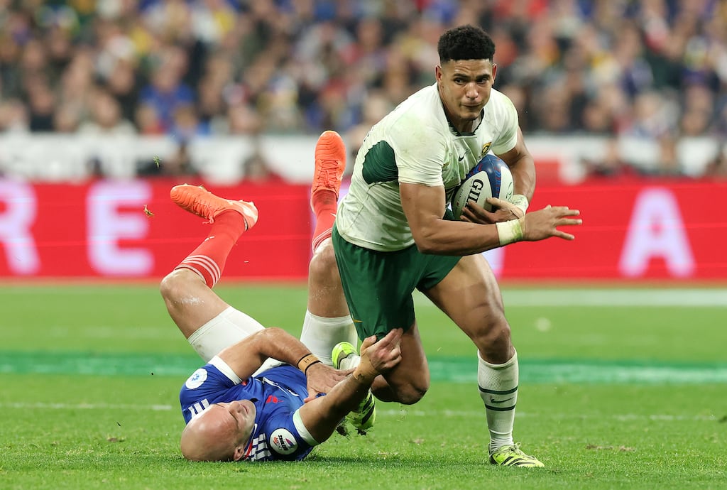 Sacha Feinberg-Mngomezulu of South Africa breaks with the ball as he evades Maxime Lucu of France. Photograph: David Rogers/Getty