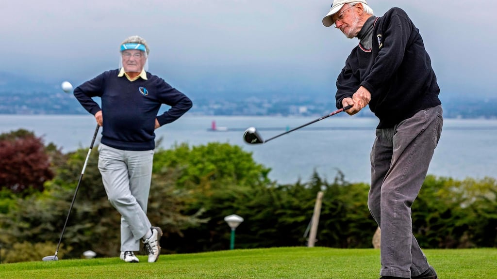 Michael O’Hanlon and Liam Cahill at Howth Golf Club in Dublin on Monday, as golf courses reopen and Ireland cautiously begins to lift it’s coronavirus lockdown. Photograph: Paul Faith/AFP via Getty Images