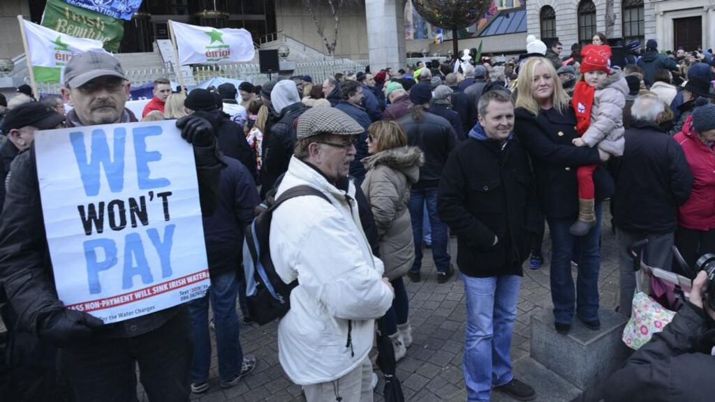People Before Profit TD Richard Boyd-Barrett poses for a picture at the anti-water charges protest at the Central Bank in Dublin last February.Photograph: Dave Meehan