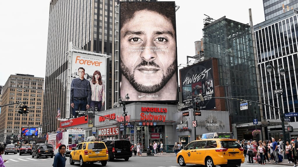 A Nike Ad featuring American football quarterback Colin Kaepernick on display in New York last month. Photograph: Angela Weiss/AFP