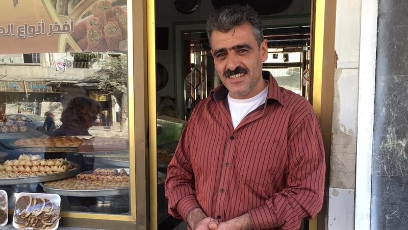Aleppo regeneration: The beacon shop in eastern Aleppo with proprietor Fahd Aziz Hokan. Photograph: Michael Jansen