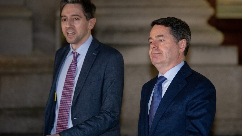 Minister for Health Simon Harris and Minister for Finance Paschal Donohoe speaking to the media at Government Buildings on Monday night. Photograph: Tom Honan