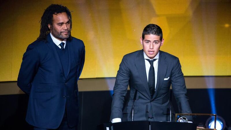 Fifa Puskas Award winner James Rodriguez of Colombia and Real Madrid speaks next to Christian Karembeu of France during the FIFA Ballon d’Or Gala 2014 at the Kongresshaus in Zurich, Switzerland. Photograph: Philipp Schmidli/Getty Images