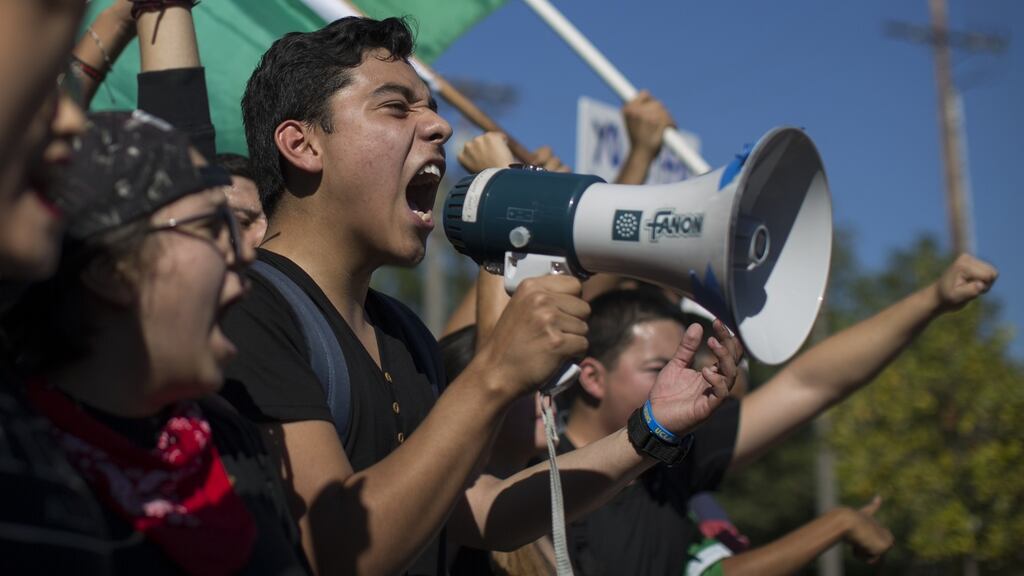 High school students marching to City Hall in Los Angeles last week to protest at the election of Donald Trump. Many are Latino youths who fear their families could be split up through mass deportations of immigrants. Photograph: David McNew/Getty Images
