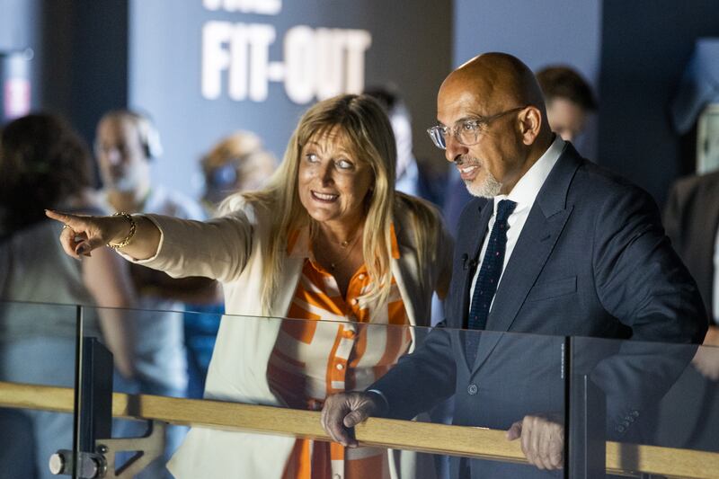 Titanic Belfast chief executive Judith Owens with the then British chancellor of the exchequer, Nadhim Zahawi, at the visitor centre in 2022