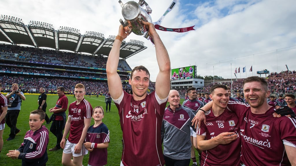 Galway’s Conor Cooney celebrates with the Liam MacCarthy cup after the All-Ireland final victory over Waterford. Photograph: Cathal Noonan/Inpho