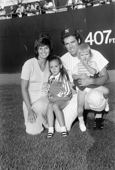 Susanne Kekich and Mike Kekich with their daughters. Photograph: Louis Requena/MLB via Getty Images