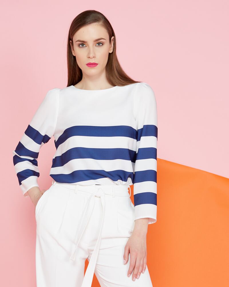 Lennon Courtney at Dunnes Stores: Breton stripe top €49, white high wide-leg trousers €79