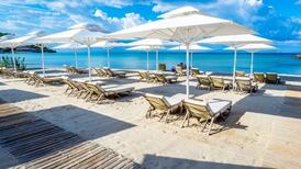 Travel insurance holders should renew policies to retain Covid-19 cover, expert advises