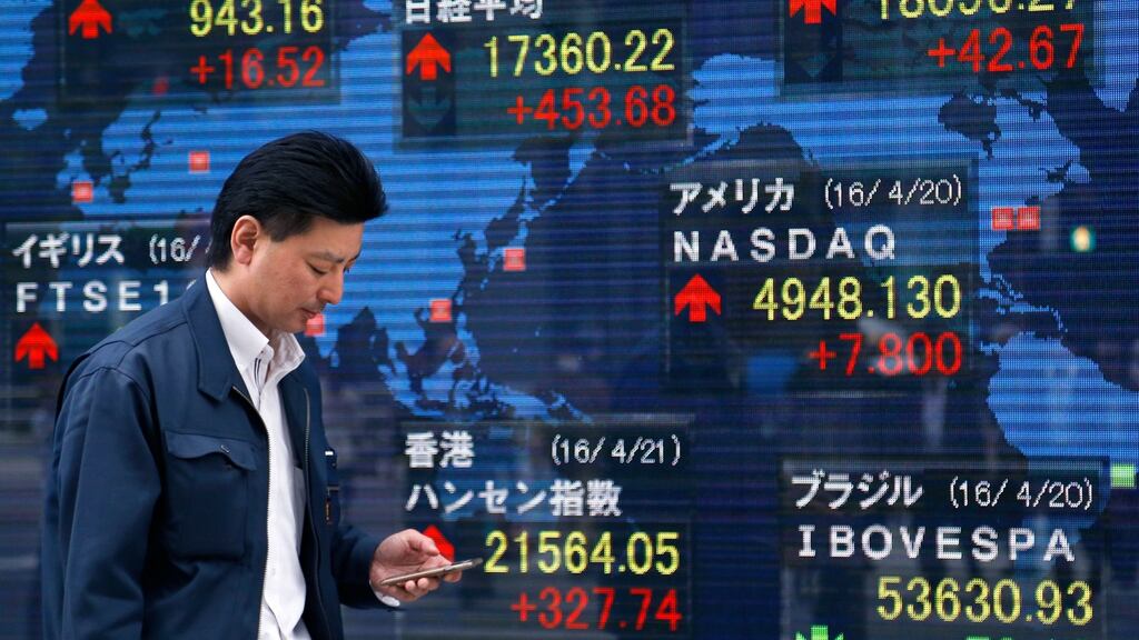 The yen fell on Friday over speculation that the Bank of Japan could start paying banks to borrow its cash. Photograph: Shizuo Kambayashi/AP Photo