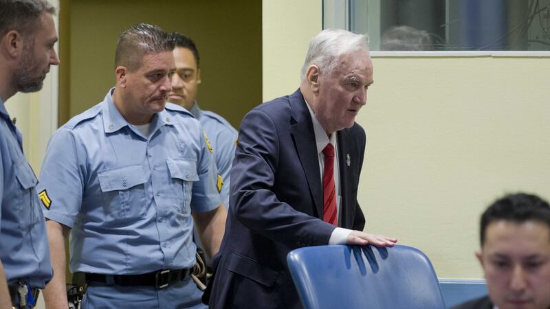 Ratko Mladic, the former Bosnian Serb general, entering  the courtroom in The Hague on Wednesday. Photograph: Peter Dejong/Pool via The New York Times