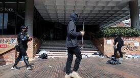 Hong Kong protests: schoolchildren in uniform arrested