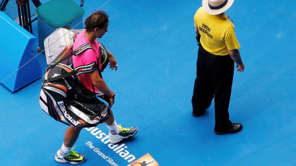 Rafael Nadal of Spain walks off the court after being defeated by Tomas Berdych of the Czech Republic in their men’s singles quarter-final match at the Australian Open 2015. Photograph: Carlos Barria/Reuters