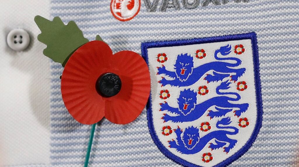 Wearing of the poppy by players in international matches is banned by Fifa. Photograph: Reuters.