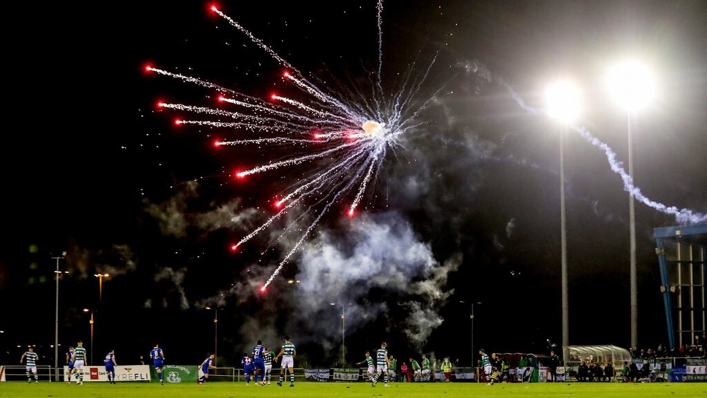 Fireworks are set off at RSC Waterford, hitting players on the pitch. Photograph: Evan Treacy/Inpho