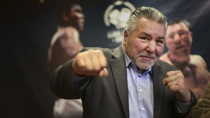 George Chuvalo in front of a poster of Muhammad Ali on the 50th anniversary of their famous bout. Photo: Richard Lautens/Toronto Star via Getty Images
