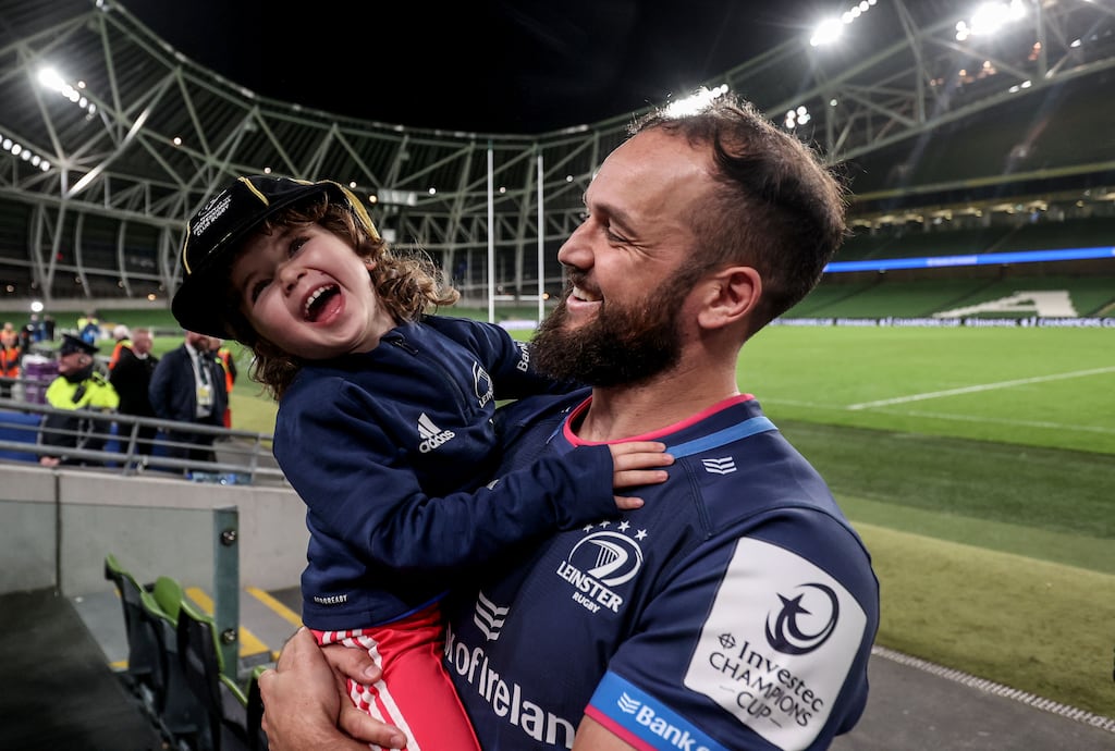 Leinster's Jamison Gibson-Park with his daughter Iris after the victory over Leicester in the Investec Champions Cup Round of 16 at the Aviva Stadium. Photograph: Dan Sheridan/Inpho