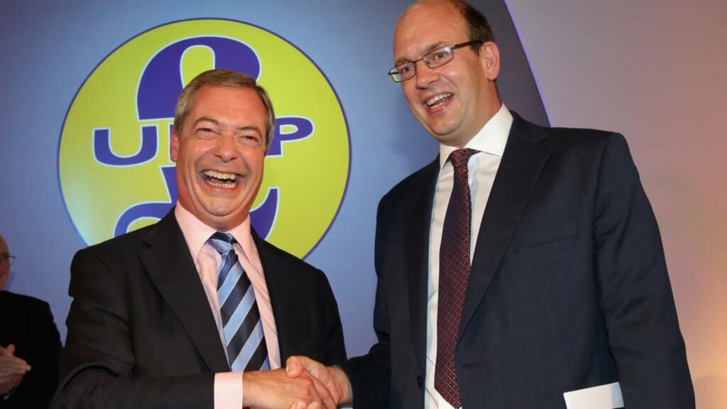 Conservative MP Mark Reckless (right) is welcomed to Ukip by party leader Nigel Farage after the tory MP announced he was defecting to the party. Photograph:  Christopher Furlong/Getty Images