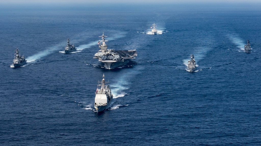 The US navy aircraft carrier USS Carl Vinson (centre) and other warships have been diverted from Singapore to waters off the Korean Peninsula. Photograph:  Matt Brown/ US navy/EPA