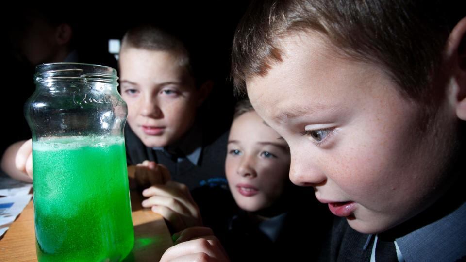 Jack Corless, Eric Davis and Christopher Slaughter taking part in Science Week events