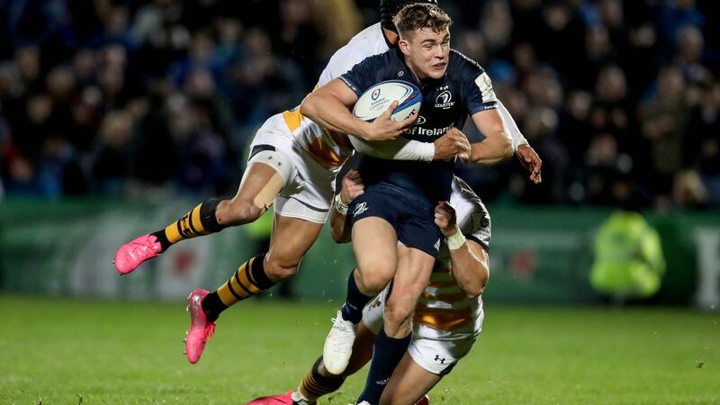 Leinster’s Garry Ringrose is tackled by Juan de Jongh and Josh Bassett of Wasps during the Heineken Champions Cup match at the RDS. Photograph: Dan Sheridan/Inpho
