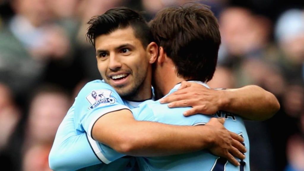 Manchester City goalscorers Sergio Aguero and David Silva celebrate the latter’s goal against Norwich City at Etihad Stadium. Photograph:  Ben Hoskins/Getty Images