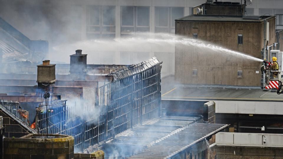 Water is sprayed onto the blaze at the Glasgow School of Art Charles Rennie Mackintosh Building in Glasgow, Scotland. Photograph: Jeff J Mitchell/Getty Images