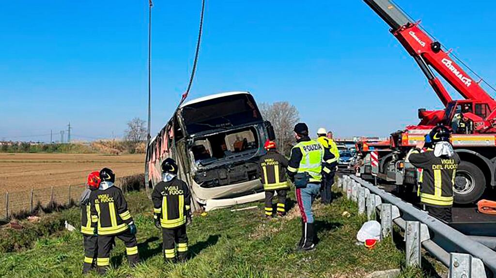 Police and rescue services attend the scene of a bus crash near Forli, Italy, on Sunday. Photograph: Italian interior ministry via AP