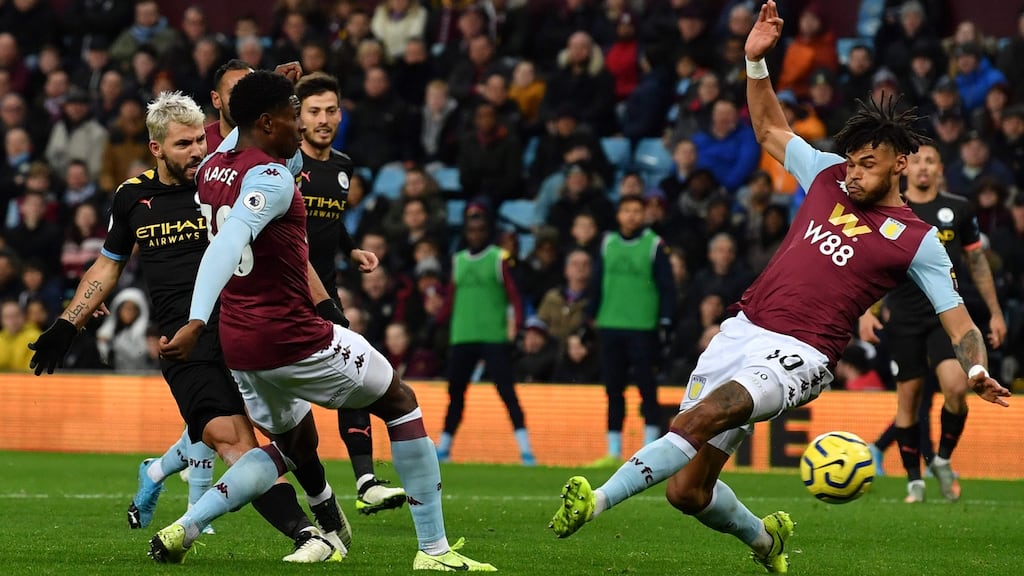 Sergio Aguero scores his second and Manchester City’s fifth against Aston Villa. Photograph: Paul Ellis/Getty/AFP