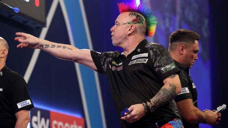 Peter Wright is into the World Championship final after seeing off Gerwyn Price. Photograph: Sean Dempsey/EPA