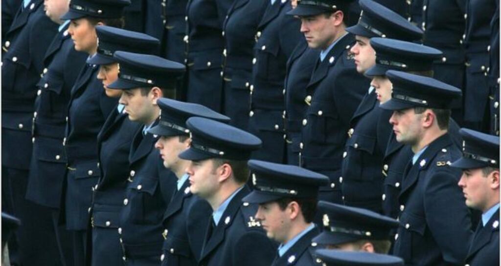Gardaí marching during their graduation ceremony at Templemore. There are now fewer than 13,100 gardai, almost 1,600 less than the peak levels of 14,600 just after the economy collapsed. Photograph: Brenda Fitzsimons