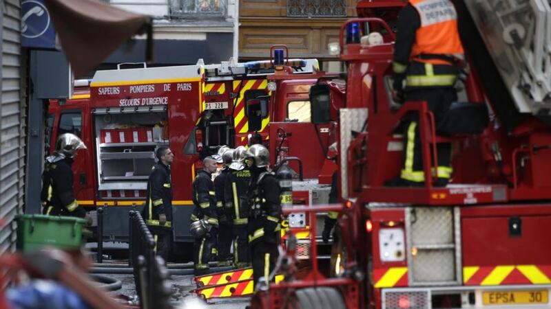 Two children died in the fire. Photograph: Kenzo Tribouillard/AFP/Getty Images